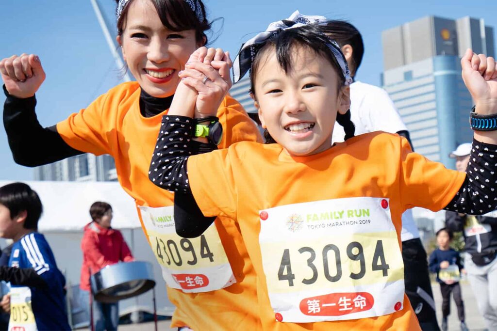Des coureurs participant à la Family Run, lors du Marathon de Tokyo
