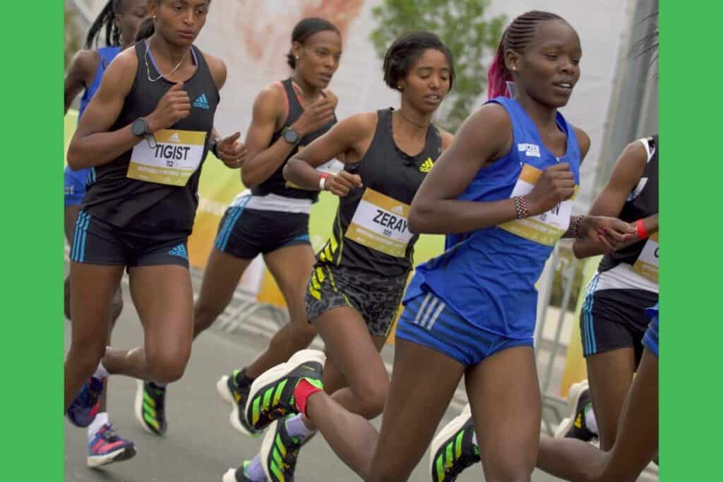 athlète élite qui porte adizero adios pro 3